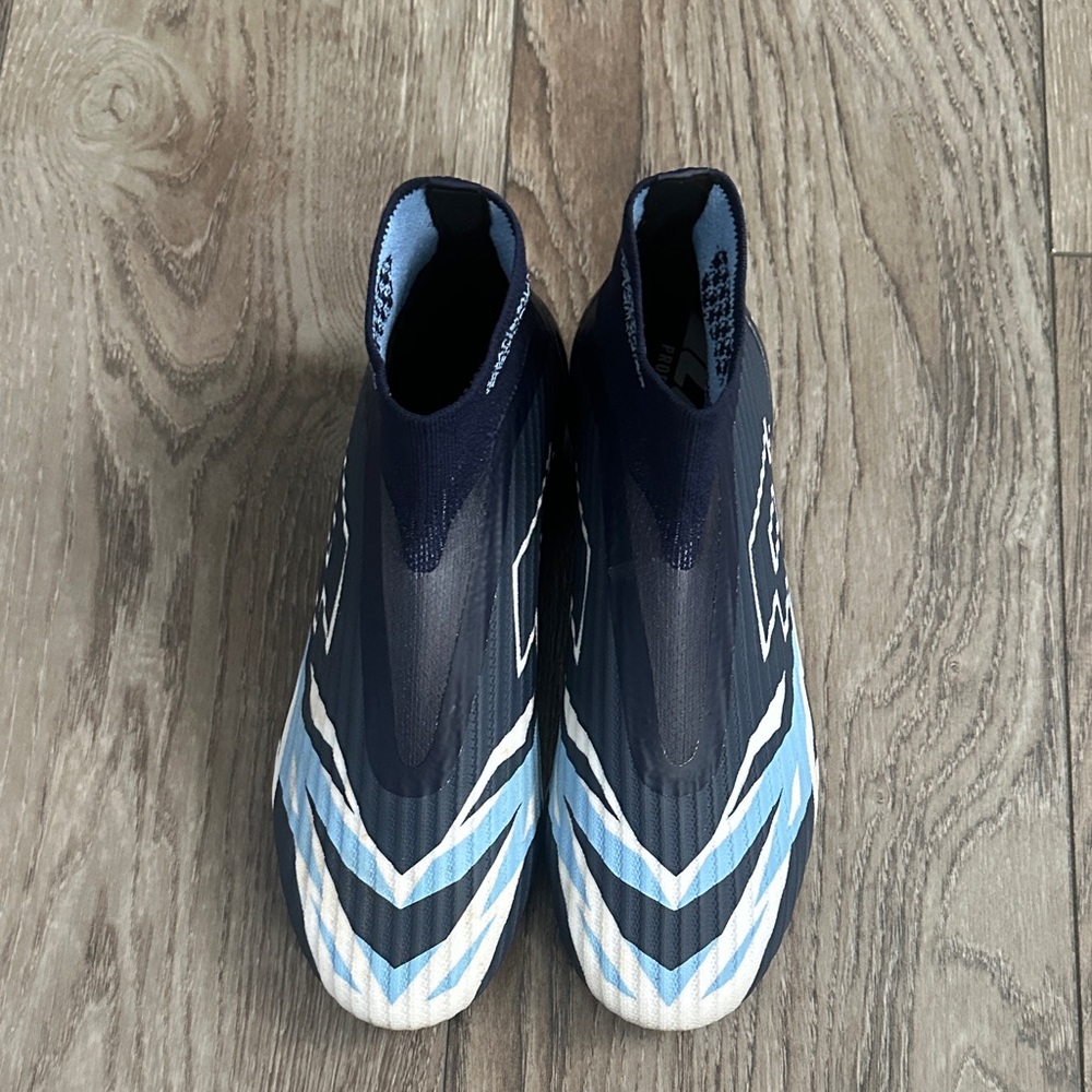 Lotto blue and white soccer shoes